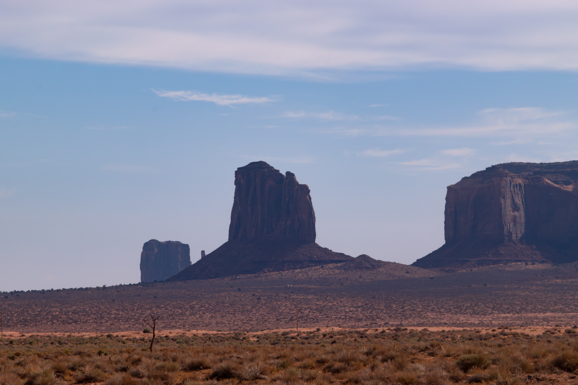 Monument Valley landscape — sandstone formations rising from the desert floor, September 2022