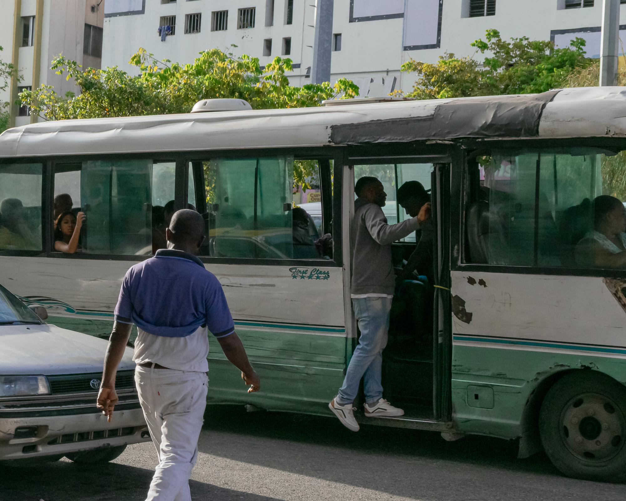 Inside a Santo Domingo bus — daily transit, urban transport, daily life