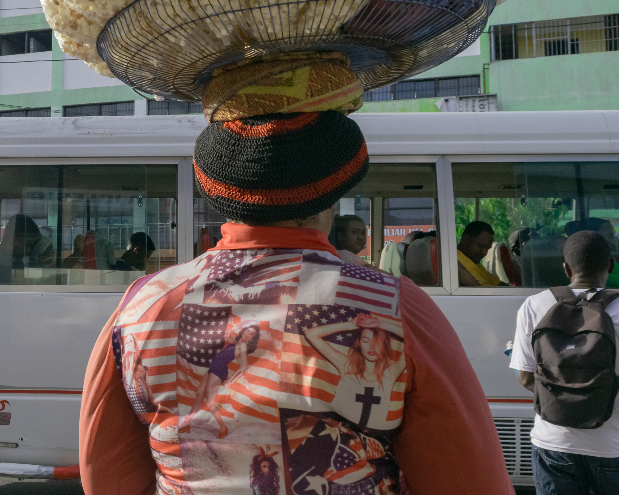 Men on the street in Santo Domingo — communal, social, vivid color